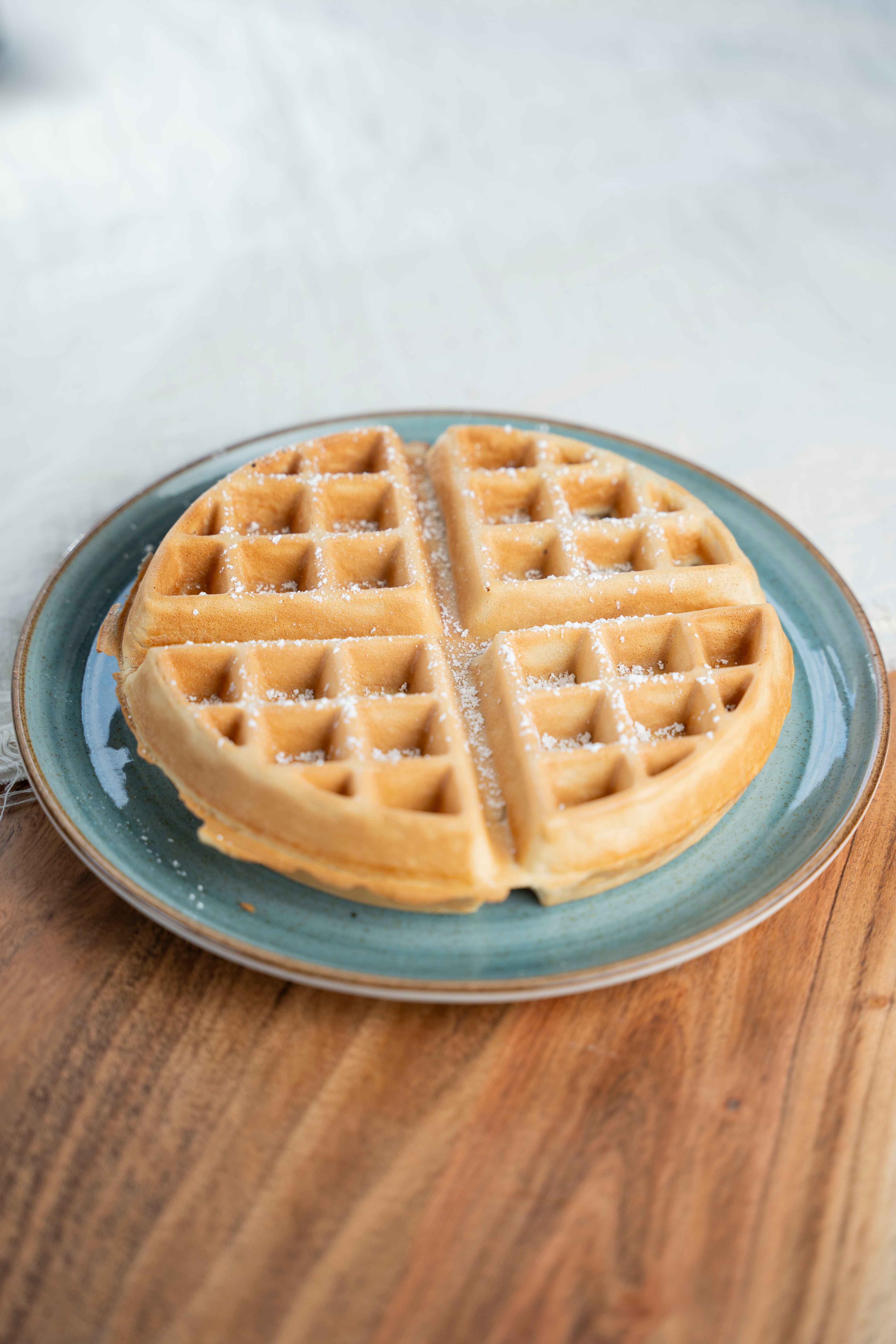 Belgian waffle topped with fresh strawberries