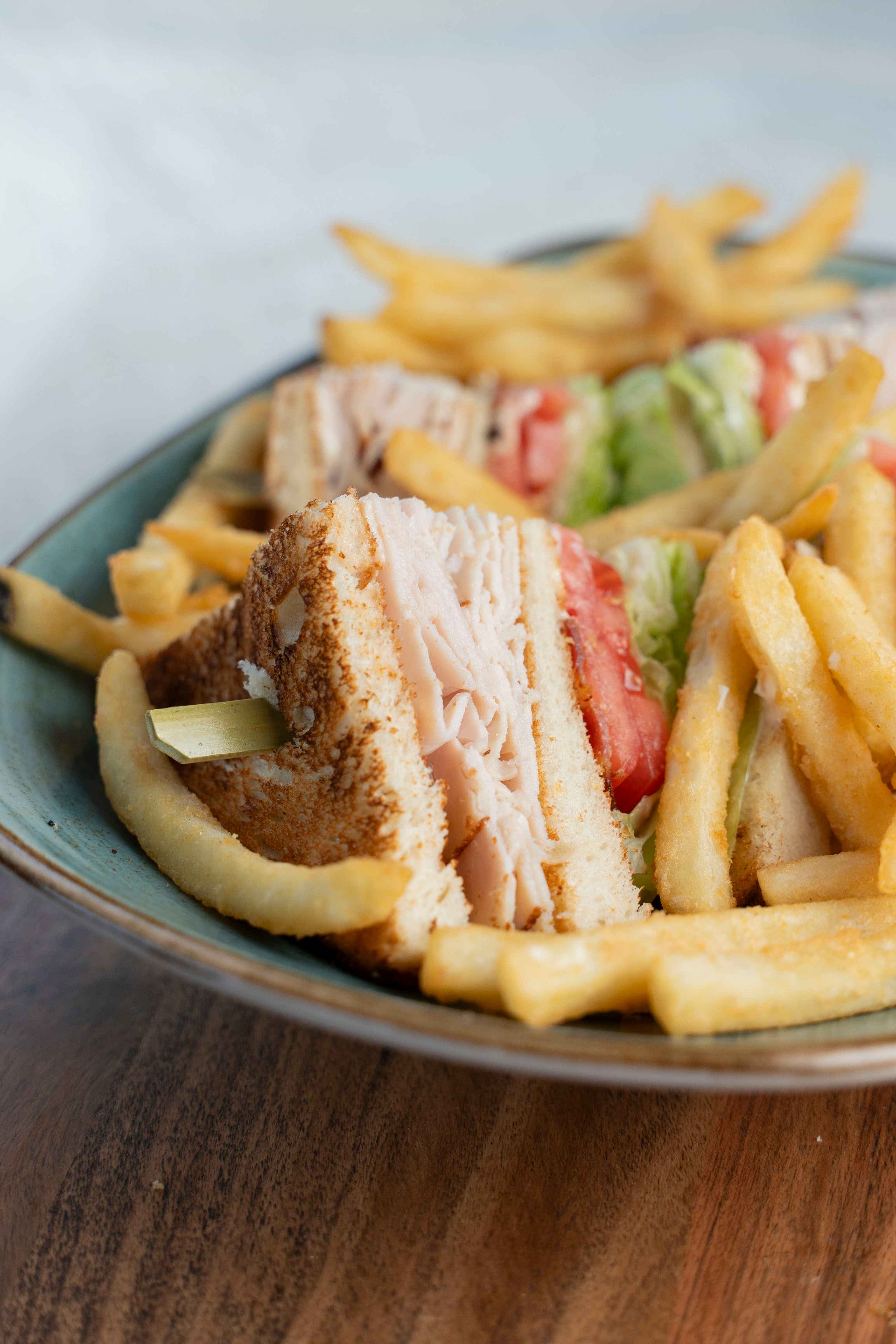 Belgian waffle with strawberries and syrup